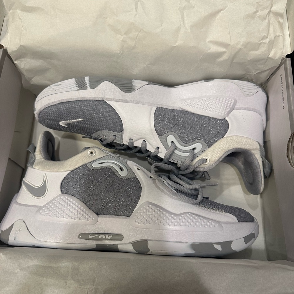 Gray and white Nike Paul George shoes